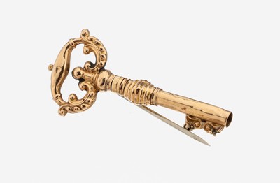 18 kt Gold Brosche, um 1900, GG 750/000, Darstellung eines Schlüssels, rs. Zinnlot, Nadel unedel, ca. 3.0 g