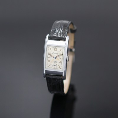 MINERVA rechteckige verchromte Armbanduhr, Schweiz 1940er Jahre, Handaufzug, Boden aufgedr., silb. Zifferbl. pat./fl., Leuchtind. u. arab. ...