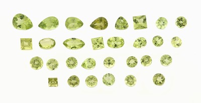 Lot lose facett. Peridots zus. ca. 12.95 ct, versch. Schliffformen, Farben und Größen