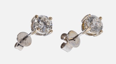 Paar 14 kt Gold Brillant-Ohrstecker, WG 585/000, 2 Brillanten zus. ca. 1.01 ct Weiß- l.get.Weiß/p
