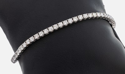 14 kt Gold Brillant-Linienarmband, WG 585/000, 60 Brillanten zus. ca. 4.80 ct feinesWeiß-Getönt/vs-si, L. ca. 18.5 cm, Kastenschloss mit 2 ...