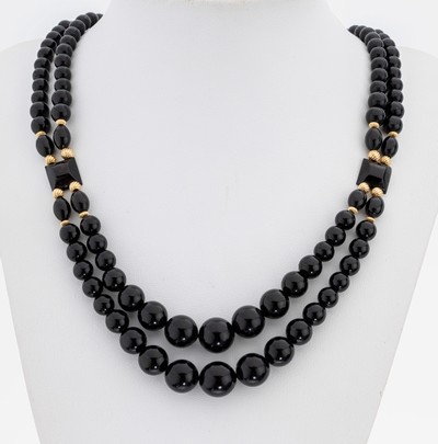 14 kt Gold Collier, wohl um 1930, schwarze Bakelit-Kugeln, D. ca. 4.1-11.7 mm, Zwischenglieder und Steckschließe GG 585/000, L. ca. 47 cm