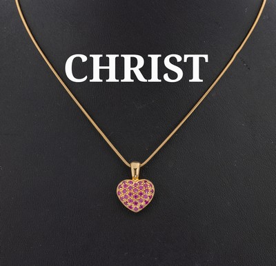 14 kt Gold CHRIST Rubin-Herzanhänger, GG 585/000, 31 rundfacett. Rubinen zus. ca. 0.60 ct, beh., an Schlangenkette, L. ca. 44 cm, ca.6.7 g, im Etui
