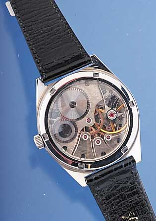 REVUE Herrenarmbanduhr, Schweiz um 1997, Edelst. beids. vergl., Boden geschr., bei Fer-tigst. wassergesch., schwarzes Kontrastziffer-bl., 17 St., ...