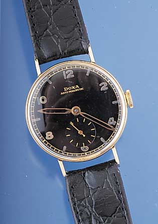 DOXA Herrenarmbanduhr Modell Antimagnetique, Ref.-Nr. 11112, Schweiz/Frankreich um 1940, GG 750/000-Rundgeh., D. 32 mm, Boden u. Glas- rand gedr., ...