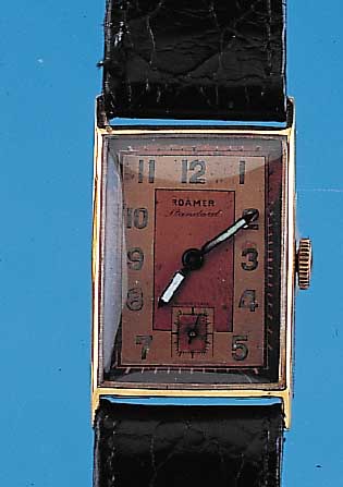 ROAMER Herrenarmbanduhr Modell Standard, Schweiz um 1938, Metall nachverg., Edelst.- Boden gedr., zweifarb. teilw. verkupfertes Orig.-Blatt, ...