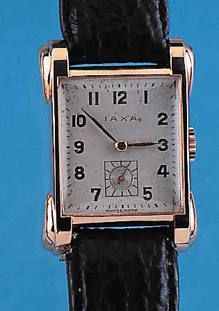IAXA Herrenarmbanduhr, Schweiz um 1950, Metallgeh. aufw. nachverg., Edelst.-Boden ge- dr., Orig.-Blatt l. fleck., 15 St., Rundanker-werk, ...