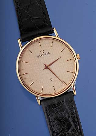 ETERNA Herrenarmbanduhr Modell Quartz, Ref.-Nr. 140432968S, Schweiz um 1990, GG 750/000, flache Gesamtausf., Boden gedr., Mineralflach-gl., ...