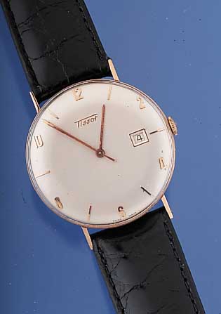 TISSOT Herrenarmbanduhr, Ref.-Nr. R76004-1, Schweiz um 1949, RG 750/000, D. ca. 36 mm, Zentralsek., Datum, Boden u. Glasr. gedr., 17 St., ...