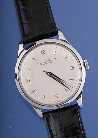 IWC Herrenarmbanduhr, Ref.-Nr. 1345617, Schweiz um 1955, Edelst., Boden u. Glasr. ge- dr., Blatt rest., Kal. 89, Streifenschl., Handaufzug, ...