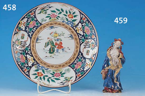 PORZELLANFIGUR, JAPAN, UM 1870, DARSTELLUNG EINES HöLLENWäCHTERS, BUNT BEMALT, GOLDSTAF- FAGE, H. CA. 19 CM, LEICHT REST., AM SOCKEL L. BEST.
