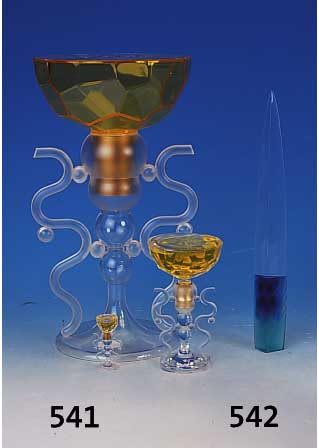 Drei Factisenflakons, Ohlala von Loris Azzaro, farbloser und bernsteinfarbener Kunststoff,die beiden kleineren Glas in Kunststoffhal- terungen, H. ...