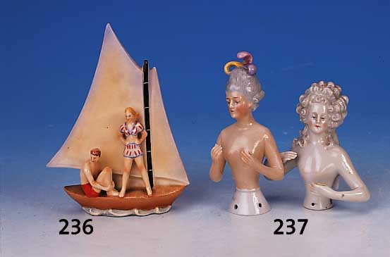 Zwei Teepuppenk”pfe, deutsch, 30er Jahre, 1 x Wilhelm Goebel, H. ca. 12.5 bzw. 10 cm, Porzellan, bunt bemalt