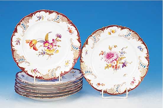 7 Dessertteller, Nymphenburg, Ende 19. Jh., Porzellan, Blumenbouquetbemlaung, Goldstaffageroter Rand, D. 21 cm