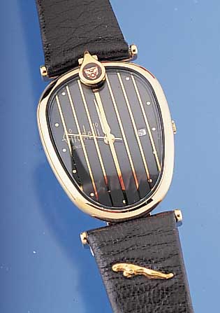 GIRADELLI Designerherrenarmbanduhr, Jaguar, Schweiz um 1997, Metall hartverg., Edelst.- Boden aufgedr., bomb. Mineralglas, Form eines Autokühlers ...