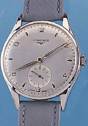 LONGINES HERRENARMBANDUHR, REF.-NR. 7035- 3/558, SCHWEIZ CA. 1955, EDELST., BODEN UND GLASRAND AUFGEDR., BLATT REST., KL. SEK. VERT., ...
