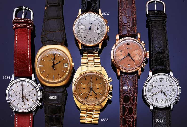 GIRARD PERREGAUX Herrenarmbanduhr, Modell Quartz, GG 750/000, Datum , Zentralsek., Kal. 352-536, Orig.-Lederband, Schweiz ca. 1972, ca. 43 x 39 ...