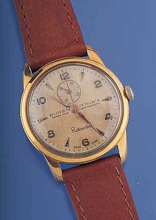 BUREN Herrenarmbanduhr Modell Grandprix, Ref.-Nr. 681801, Schweiz um 1955, Messing ver-g., Edelst.-Boden geschr., Orig.-Blatt, m. ...