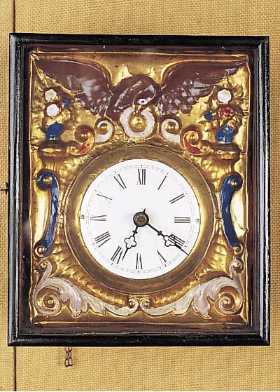 Rahmenuhr, wohl Karlstein, um 1880/90, geprägte Messingumrandung, farblich gefaßt, Holzplatinenwerk, Originaltüren, Stundenschlagauf ...
