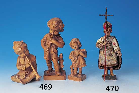 Drei Holzfiguren, deutsch, 50er Jahre, Lindenholz geschnitzt, musizierende Kinder, H. ca. 23/16/15.5 cm