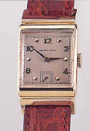 HAMILTON HERRENARMBANDUHR, REF.-NR. S774139,USA UM 1940, GG 585/000, RECTANG.-FORM, BODEN GEDR., VERS. BLATT M. AUFGES. ...