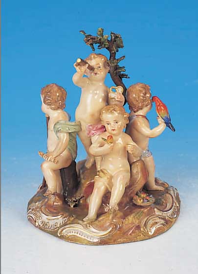 PORZELLANFIGURENGRUPPE, MEISSEN, UM 1860, FüNF PUTTEN MIT BLUMEN, OBST, STAB, FERNROHR UND PAPAGEI, BUNT BEMALT, GOLDSTAFFAGE, TEIL- ...