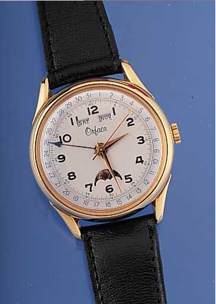 ORFAOR Herrenarmbanduhr Vollkalender, Schweiz um 1997, Metall hartverg., Edelst.- Boden u. Glasrand gedr., aktuelle Remontage m. Venuskal. ...