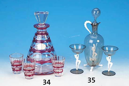 LIKöRSET, BIMINI, ÖSTERREICH, UM 1900, GRAUES GLAS, STIELE IN FORM VON TäNZERINNEN, H. CA. 11/24 CM, SECHS GLäSER UND KARAFFE