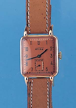 WITBA Herrenarmbanduhr Modell Shockresist, Schweiz um 1940, RG 750/000, Carree-Arronde- Form, tropfenförm. Bandanst., Boden gedr., kupferfarb. ...
