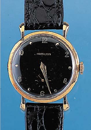 HAMILTON Herrenarmbanduhr, Ref.-Nr. B27300, USA um 1955, 10 kt. GG-Rundgeh., Glasr. gedr.,Blatt rest., auf Boden Widmungsgrav. von ...
