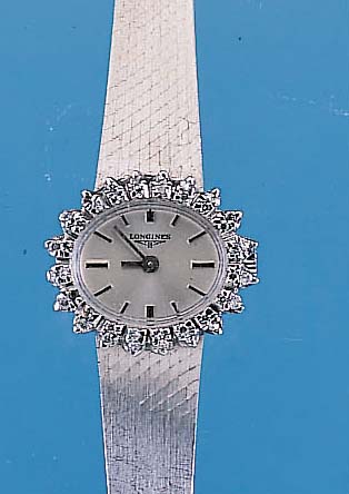 LONGINES Damenarmbanduhr, neutr. WG 750/000-Geh. incl. WG-Milanaiseband, Lünette m. 40 8/8Diamanten zus. ca. 0,4 ct feines Weiß, Boden gedr., ...