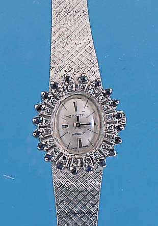 ZENITH DAMENGOLDBANDUHR, NEUTR. WG 750/000- OVALGEH. INCL. WG-FLECHTBAND, LüNETTE M. 20 8/8 DIAM. ZUS. CA. 0,3 CT FEINES WEIß U. 20 SAPHIREN, ...