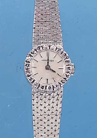 LONGINES DAMENGOLDBANDUHR, NEUTR. WG 750/000-GEH. INCL. WG-FLECHTBAND, LüNETTE AUFW. M. 18 8/8 DIAMANTEN ZUS. CA. 0,54 CT FEINES WEIß,BLATT MATT ...