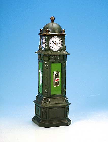 Jubiläumsuhr, zum 100jährigen Jubiläum 1876/1976 der Firma Henkel, Masseguß, in Form einer Standuhr, Seiten mit Persilwerbung,alle ...