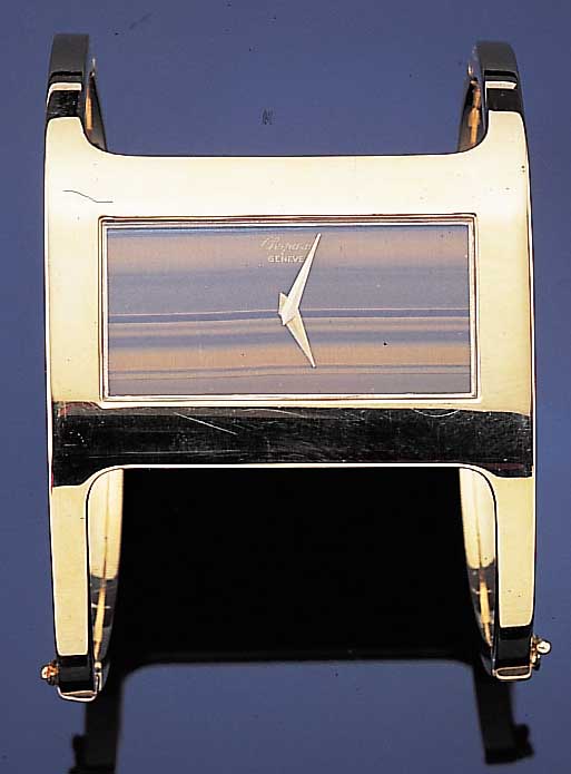 CHOPARD Damengoldbanduhr, aufwendiges Designm. Doppelspange, Schweiz um 1975, Massiv GG 750/000, Boden 6-fach verschr., Zifferbl. in Tigerauge, ...