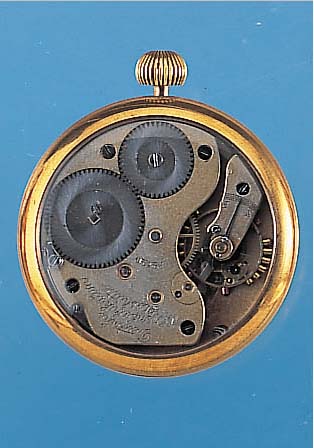 DEUTSCHE UHRENFABRIKATION Glashütte Taschen- uhrwerk im Messingschutzgeh., beids. vergl.,verg. Metallzifferbl. sign. hier Bez. Lange Uhr, 3/4 ...