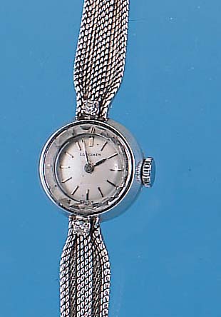 LONGINES DAMENGOLDBANDUHR, REF.-NR. 30266, SCHWEIZ UM 1966, WG 750/000 INCL. WG-FLECHT- BAND, AN DEN BANDANST. JE 1 8/8 DIAMANT, BODENGEDR., VERS. ...
