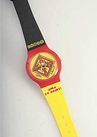 KEITH HARING HERRENARMBANDUHR ZUR MAUERöFFNUNG1990, EDITION STAECK, LIMIT. AUFLAGE, QUARTZWERK, ORIGINALVERPACKUNG, EZ 0-1