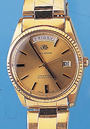 BUCHERER Herrenarmbanduhr Weekday, Ref.-Nr. 30/139, Schweiz um 1968, Metall hartverg. inclEdelst.-Band m. Sicherheitsfaltschl., Zentral-sek., Tag u. ...