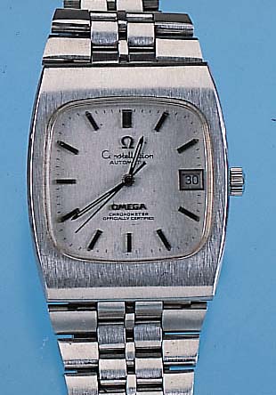 OMEGA Herrenarmbanduhr Constellation, Ref.- Nr. 168,044, Schweiz um 1974, Edelstahlstülp- geh. incl. Edelstahlband, get. Aufzugwelle, bei ...
