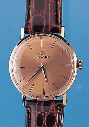 MOVADO HERRENARMBANDUHR, NEUTR. RG 750/000 GEH., BODEN U. GLASR. GEDR., KUPFERFARB. BLATTREST., 17 ST., RUNDANKERWERK, HANDAUFZUG KAL. 205, GEPR. ...