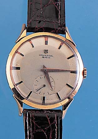 UNIVERSAL GENEVE HERRENARMBANDUHR, NEUTR. RG 750/000 GEH., BODEN U. GLASR. GEDR., D. CA.37 MM, GUILL. U. VERS. ORIG.-BLATT, RUNDANKER-WERK, 17 ...