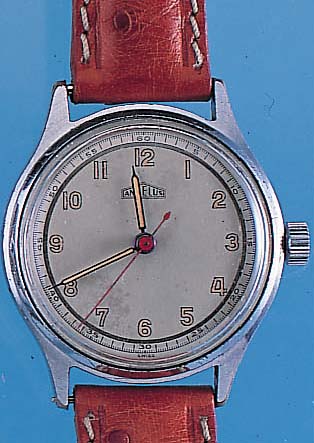 ANGELUS HERRENARMBANDUHR MODELL HERMETIC, REF.-NR. 209369, SCHWEIZ UM 1946, METALL VER- CHR., EDELST.-BODEN GEDR., VERS. ORIG.-BLATT, ALTERSBED. ...