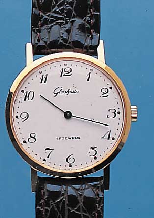 GLASHÜTTE HERRENARMBANDUHR, METALL HARTVERG.DEUTSCHLAND UM 1980, EDELST. GEDR., EMAILFARB.KONTRASTZIFFERBL., DAMENANKERFORMWERK, KAL. 09/20, 17 ...