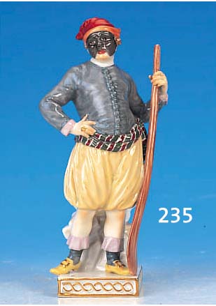 Porzellanfigur, Meissen, um 1890, 2. Wahl, aus der Comedie del Arte, bunt bemalt, Gold- staffage, l. am Stabende rest., H. 18 cm, sammelwürdig