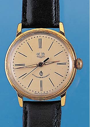GUB HERRENARMBANDUHR, REF.-NR. 124326, DEUTSCHLAND UM 1957, METALL VERG., EDELST.- BODEN GEDR., SOGEN. GüTEUHR, INCABL. STOSSGE- S., ...