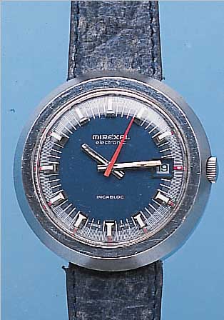 MIREXAL HERRENARMBANDUHR ELECTRONIC, REF.-NR. C750487, SCHWEIZ UM 1970, MASSIV EDELSTAHL, BOD. AUFGEDR., BEI FERT.-STELL. WASSERG., ...