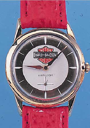 HAMILTON HERRENARMBANDUHR, SCHWEIZ/USA UM 1960, METALL M. GG-AUFLAGE, EDELST.-BODEN GE- DR., HARLEY-DAVIDSON-LOGO SPäTER, 17 ST., ...