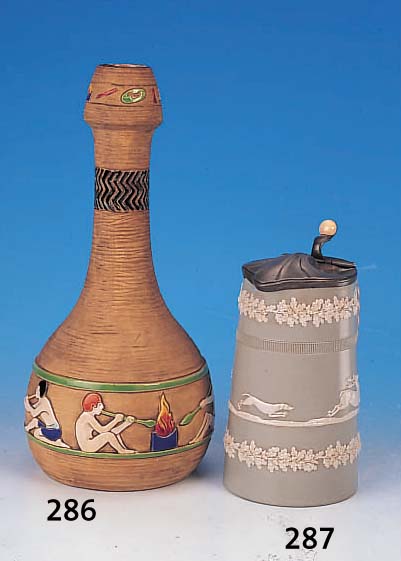 VASE, DRESSLER, THURN & TEPLITZ, UM 1910, STEINGUT, RELIEFIERTE DARST. VON GLASBLäSERN, BUNT STAFFIERT, H. CA. 32 CM, MIN. ALTERSSP.
