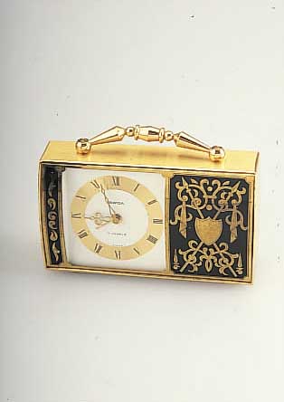 SWIZA TISCHWECKER MIT WALZENSPIELWERK, MESSING HARTVERG., 7 ST., SCHWEIZER ANKERWERK,UM 1960, MAßE CA. 7 X 20,5 CM, GEHFäHIG/IN- TAKT, EZ 2